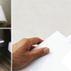 Illustration for article titled Plug-In Table Illuminates Rooms, Stores Books and Charges Gadgets